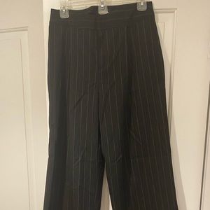 Straight leg black dress pants, high waisted.